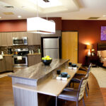 a kitchen connected to a bedroom at Copley Health Center