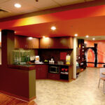 s kitchenette and seating area by Orange Spot Bistro