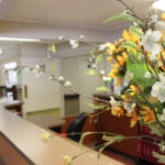 close up of bouquet of flowers on the front desk