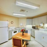 kitchen with washer and dryer at Southwood Healthcare Center