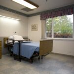 patient room with single bed at Harrison Healthcare Center